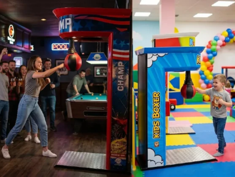 Arcade machines for entertainment venues – boxing machine in a sports bar next to a kids' boxer machine in a family entertainment center
